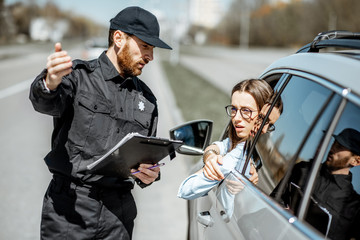 woman and police during traffic stop